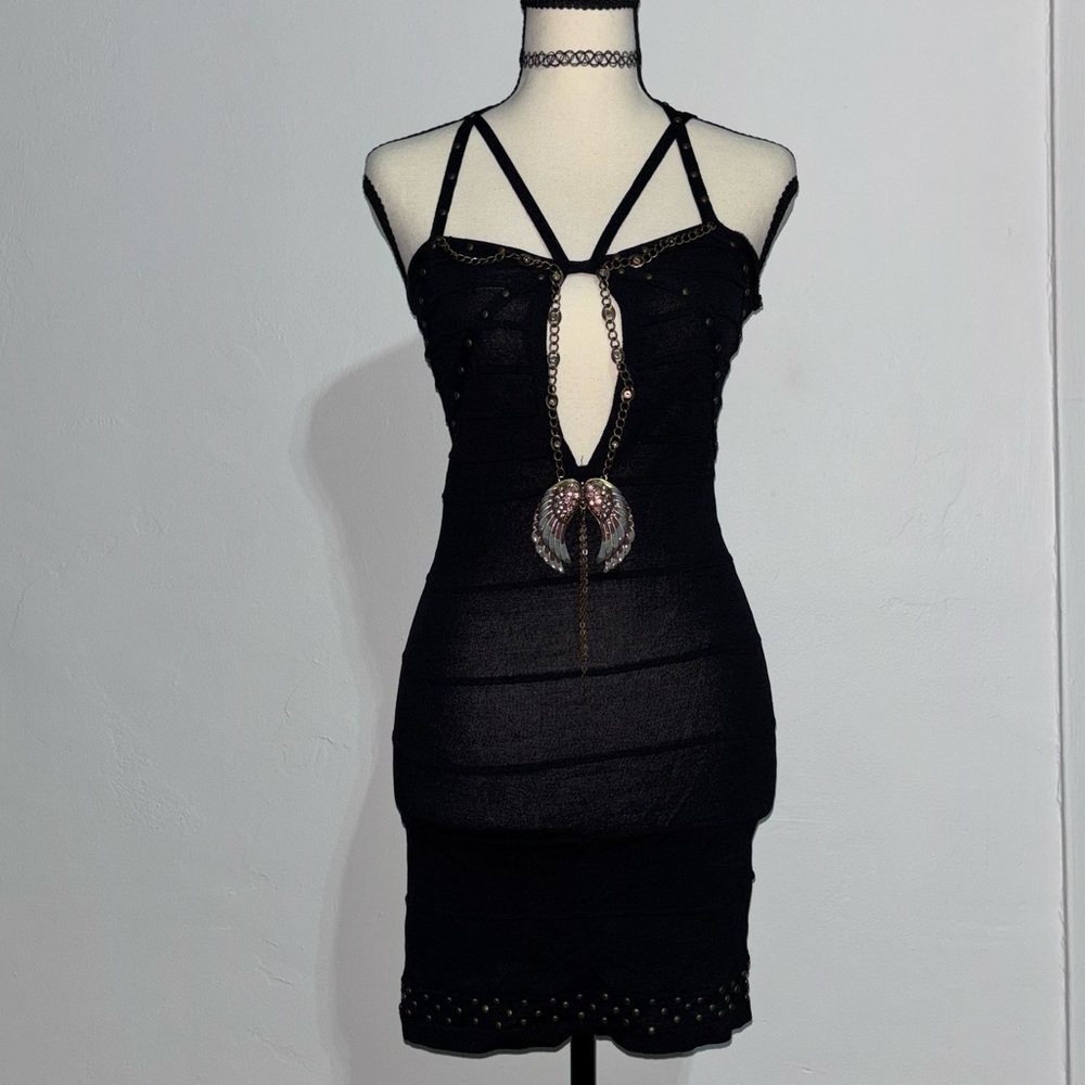Strappy Black Mini Dress with Decorative Wing Pendant
